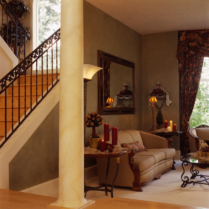 Traditional Style Living Room by Staircase