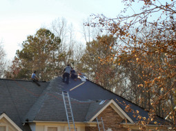 March 4, 2009 - Workers on a roof